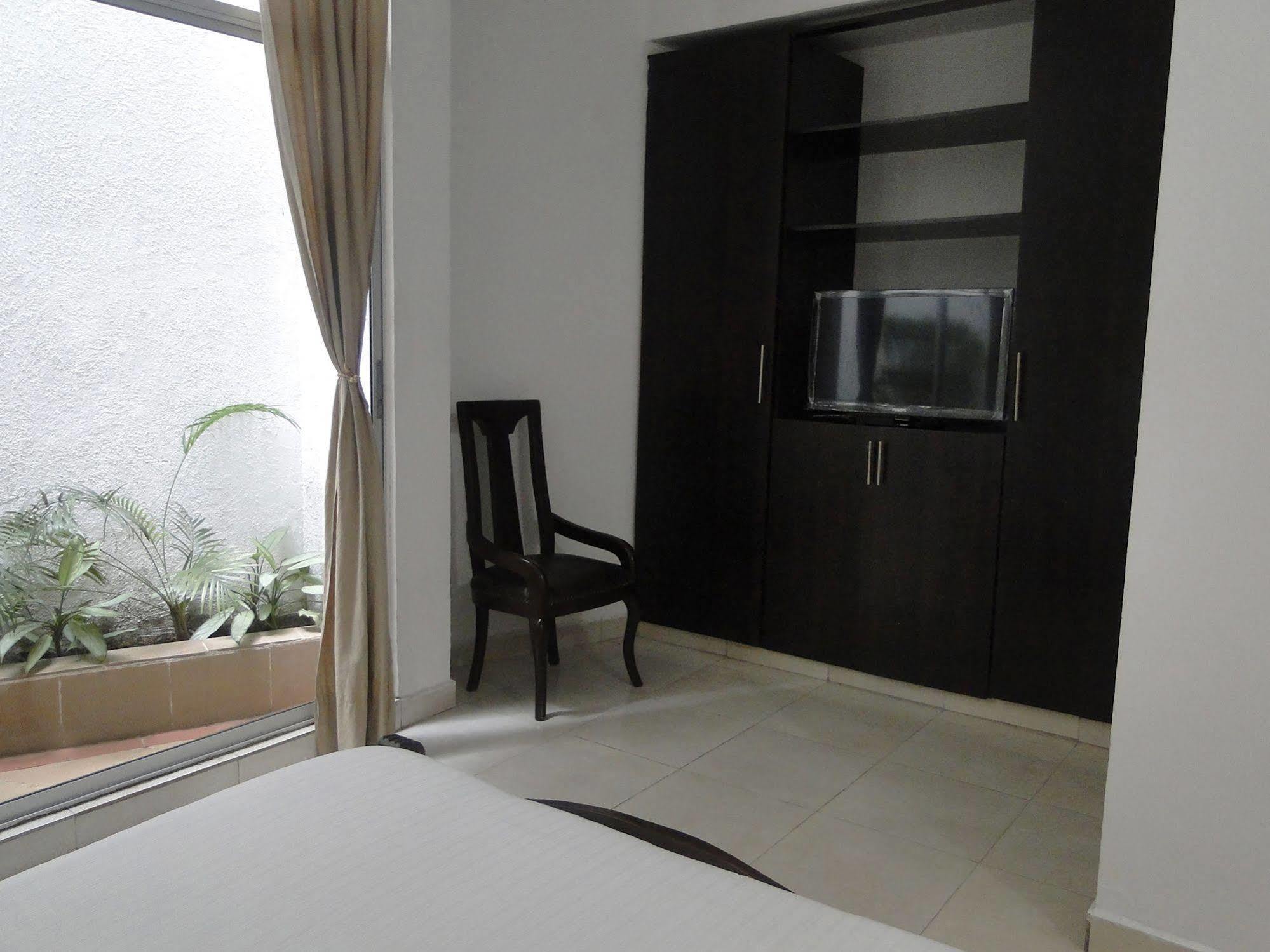 Arco Apartasuites Cali
